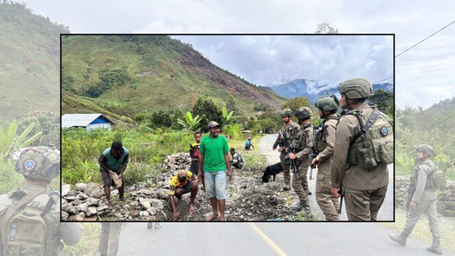 
					Humanis dan Siaga, Personel Ops Damai Cartenz Sambangi Warga Saat Patroli Keamanan di Puncak Jaya